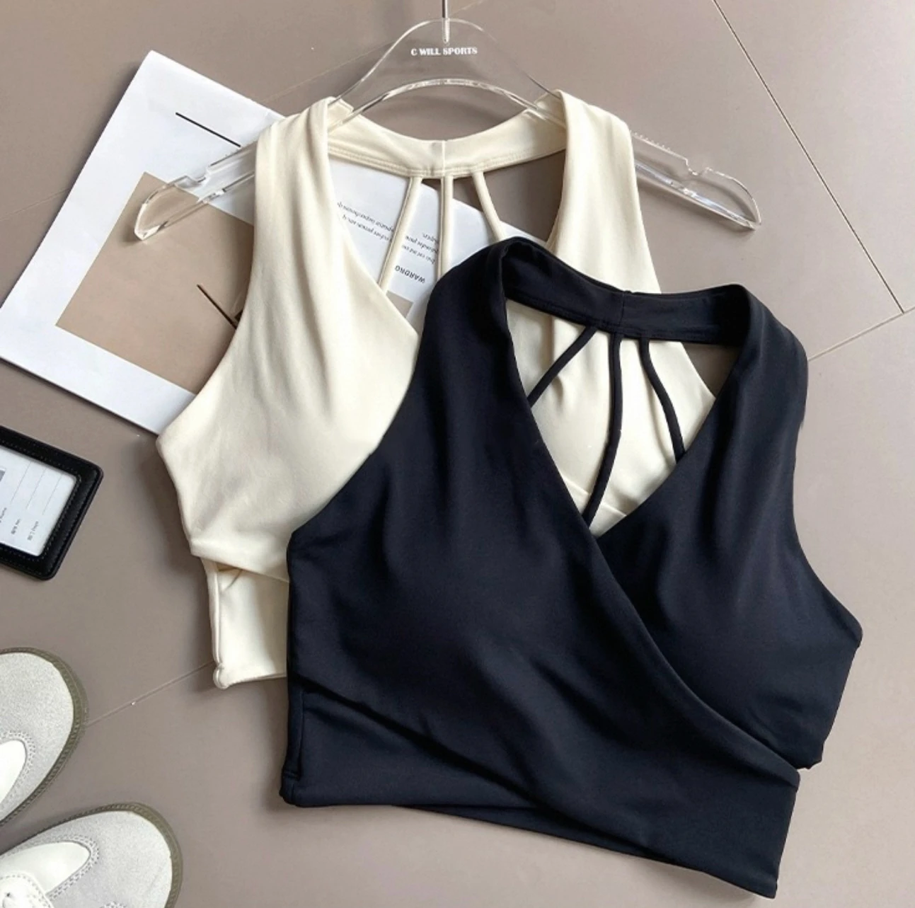 White and black wrap-front sports bras