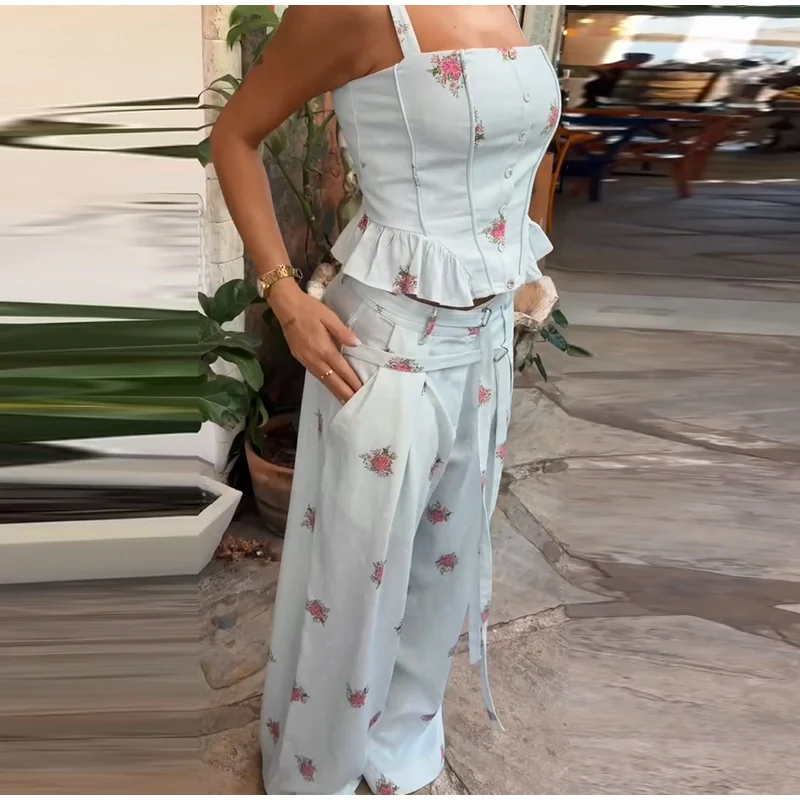 Side view of floral top and wide-leg pants