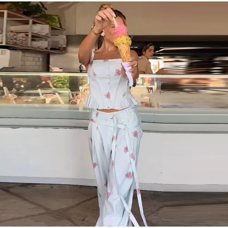 Light blue floral sleeveless top and pants outfit