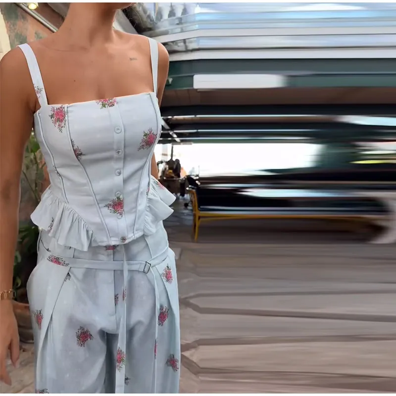 Close view of floral sleeveless top and pants