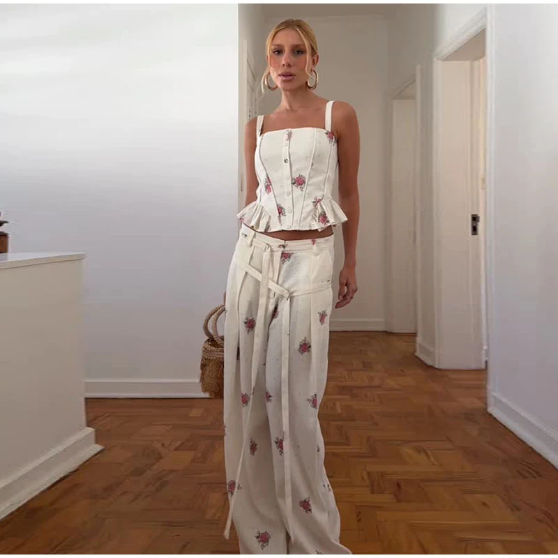Ivory floral top and wide-leg pants outfit indoors