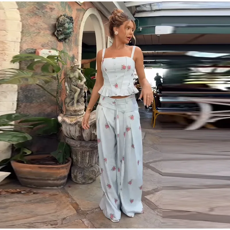 Full-length view of floral top and wide-leg pants