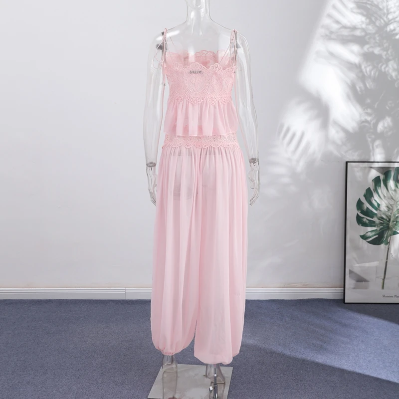 Back view of pink lace top and flowing pants set