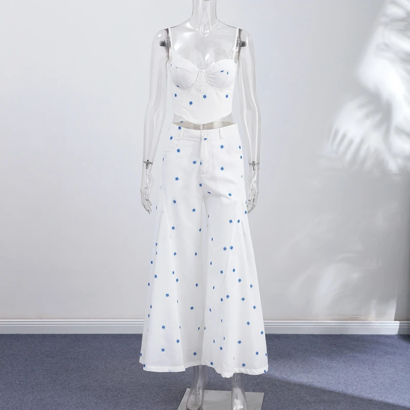 Front view of white and blue floral top and pants set